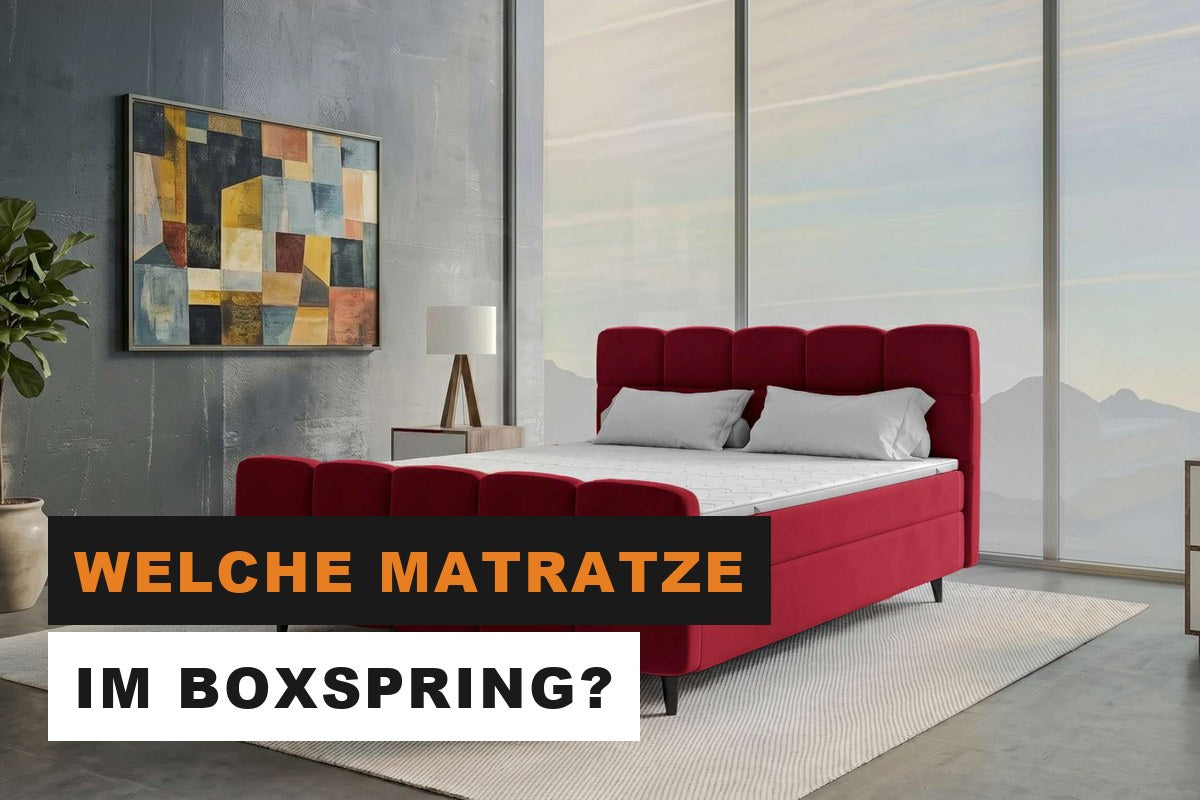 Boxspringbett mit Federkernmatratze und Topper in einem eleganten Schlafzimmer