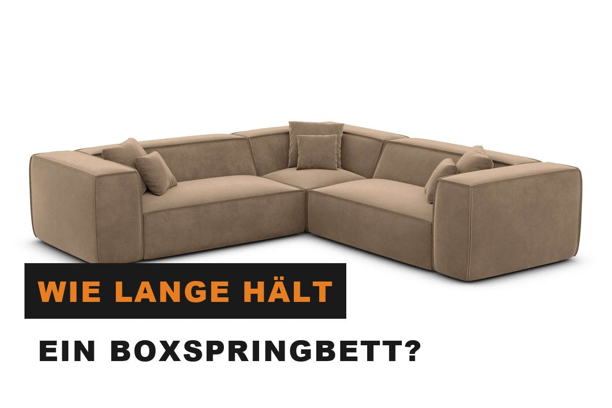 Gepflegtes Boxspringbett mit Topper und frischer Bettwäsche