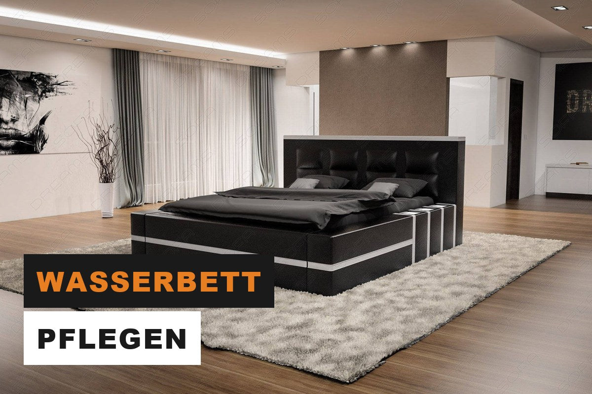 Bett mit Beleuchtung und gepolstertem Kopfteil in einem eleganten Schlafzimmer